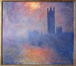 Las Casas del Parlamento, Londres, con el sol abriéndose paso entre la niebla