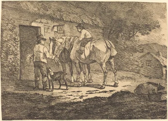 Caballos en la puerta de la cabaña