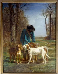 Guardias cazadores descansan con sus perros
