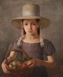 Niña con fruta en una cesta
