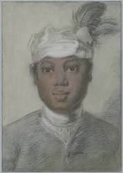 Cabeza de un joven negro con turbante con plumas