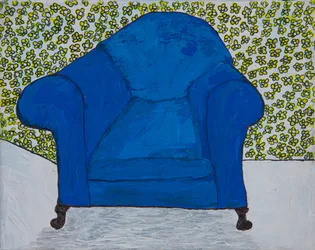 Sillón azul y flores