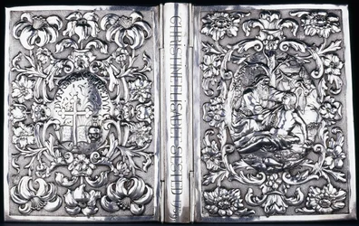 Cubierta superior e inferior del libro con follaje y una imagen del Buen Samaritano, 1740