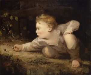 Niño jugando a las canicas