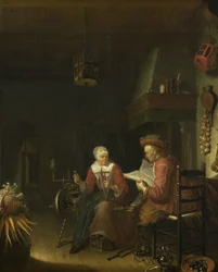 Interior con un hombre leyendo y una mujer hilando