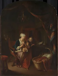 Una madre dando el pecho a su hijo