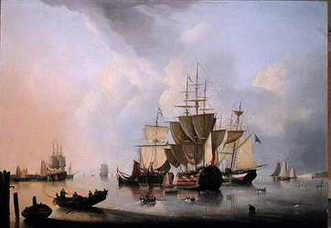 Un barco de dos cubiertas y otros barcos