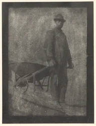 [Hombre negro con carretilla]