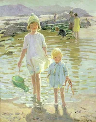 Niños en la orilla del mar