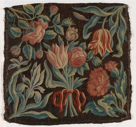 Funda de cojín de tapicería con tulipanes, etc., posiblemente fabricada en Holanda.