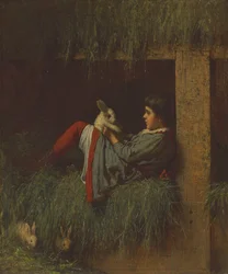 Niño jugando con un conejo