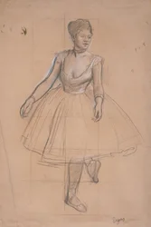 Una bailarina de ballet en posición, de frente en tres cuartos, c. 1872-73