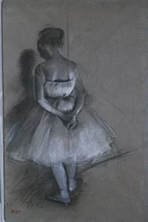 Bailarina de pie con las manos cruzadas detrás de la espalda, 1874
