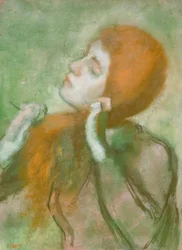 Mujer peinándose