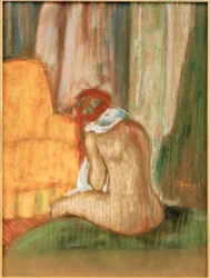 Desnudo sentado de espaldas