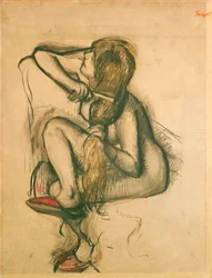 Mujer peinándose