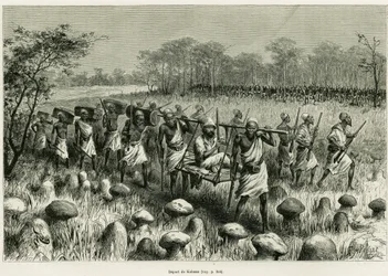 Partida de Kalassa, el narrador viajero en su silla con porteadores. Ilustración de la historia Les lacs de l