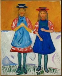 Dos chicas con delantal azul