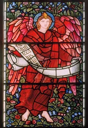 Ángel sosteniendo un pergamino, ventana este
