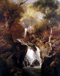Cascada a través de un bosque