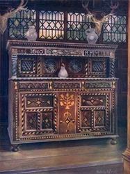 Aparador de roble tallado e incrustado