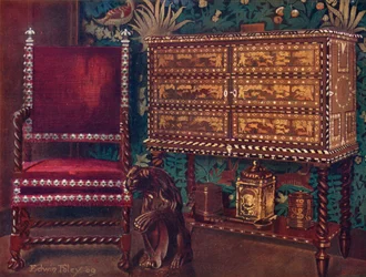 Grupo de muebles continentales de finales del siglo XVI: Gabinete portugués de castaño, incrustado con marfil, ébano y maderas de colores, silla de brazos con espiral