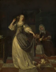 Dama jugando con un perro