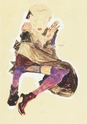 Chica sentada con medias a rayas