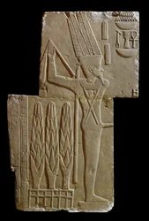 Relieve del dios Min (caliza)