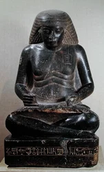 Amenhotep, hijo de Hapu, sentado con las piernas cruzadas, del Templo de Amón, Karnak, c.1391-53 a.C.