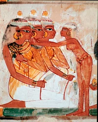 Arte egipcio: Tumba de Nakht. Aseo: criada ayudando a tres mujeres con flores de loto a ponerse joyas antes del banquete funerario. Fresco de Luxor