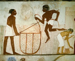 Campesinos con cestas llenas de trigo (pintura mural)
