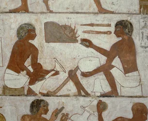 Orfebres cincelando sus productos (pintura mural)