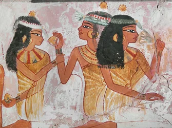 Damas ofreciendo un limón y una raíz de mandrágora a otra dama durante un banquete (pintura mural)