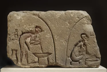 Relieve de arenisca de la preparación de una comida