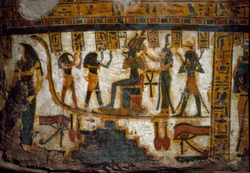 Arte de Egipto: Osiris recibe tributos de cuatro deidades: Thot, Maat, Heka (Heqat o Heqa) y Harsiesi. Uno de los dioses sostiene la llave de la vida en forma de cruz ansada (Ankh). Abajo, dos representaciones del ojo oudjat (ojo de Horus)