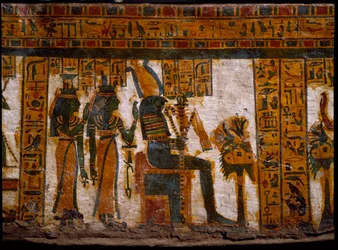 Antigüedad egipcia: las divinidades Isis y Neftis adorando a Osiris. Sostienen llaves de la vida en forma de cruz ansada (Ankh). Decoración del sarcófago antropoide del escriba Butehamon, dinastía XXI (1085-935 a.C.). Museo Egipcio de Turín