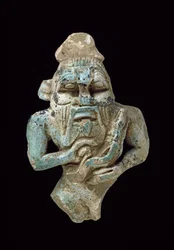 Amuleto de fayenza de Bes amamantando a Horus, c.770-715 a.C.