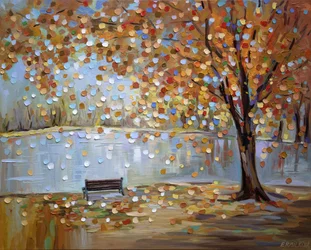 Un banco en el parque en otoño