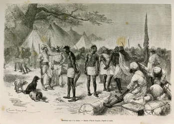 Los porteadores insolentes de la expedición encadenados, dibujo de Emile Bayard, para ilustrar la historia: A través de África, desde Zanzíbar (Tanzania) hasta Benguela (Angola), de 1872 a 1876, por el Teniente V.H. Cameron. Grabado en Le tour du monde