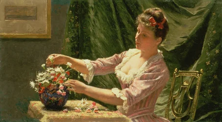 Joven mujer arreglando flores