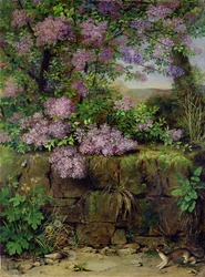 Lilas en flor frente a una pared