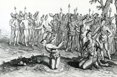 Un rey de Florida consulta a su mago antes de ir a la batalla, ilustración tomada de Viajes y travesías de Moore, 1778