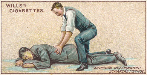 Respiración artificial, método de Schafer, no.25 de la serie de primeros auxilios de las tarjetas de cigarrillos de Willss, 1913