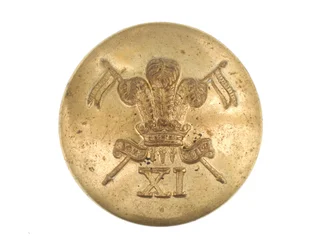 Botón, oficial, 11º