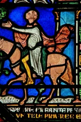 (detalle) de la Ventana del Milagro que representa a un caballero saliendo de la ciudad curado