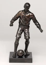 Futbolista, parte de un conjunto de reloj