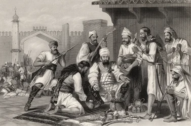 Tropas sikh dividiendo el botín tomado de los amotinados, de 