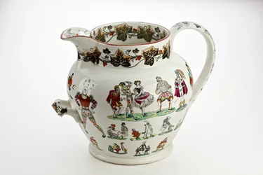 Jarra de Staffordshire decorada con figuras de Arlequín y tema de carnaval, 1866
