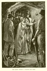 La reina visitando una mina de hierro en Cornualles